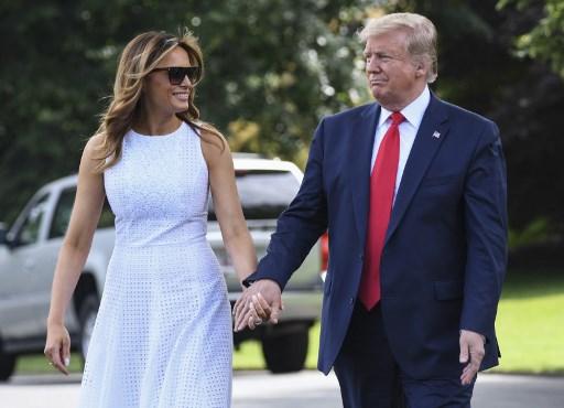 Melanija i Donald Tramp su se sve vrijeme smješkali jedno drugome - Avaz