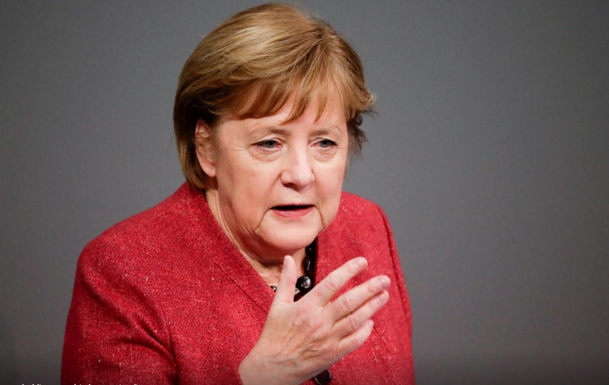 German Chancellor Angela Merkel gestures as she delivers a speech in the country's parliament, the Bundestag, in Berlin, Germany, December 9, 2020. - Avaz