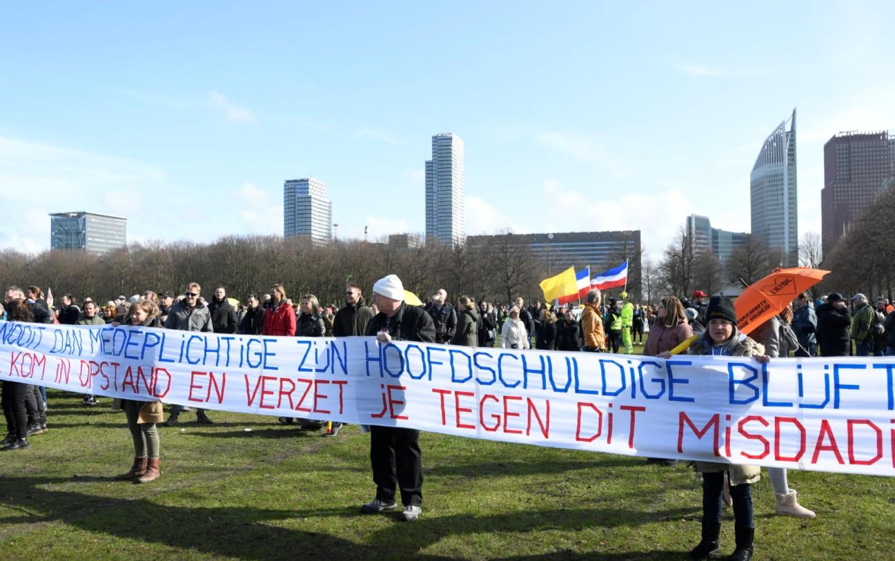 People protest against coronavirus disease (COVID-19) restrictions in The Hague, Netherlands, March 14, 2021. - Avaz