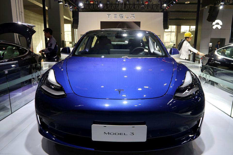 A China-made Tesla Model 3 electric vehicle is seen ahead of the Guangzhou auto show in Guangzhou, Guangdong province, China, November 21, 2019. - Avaz