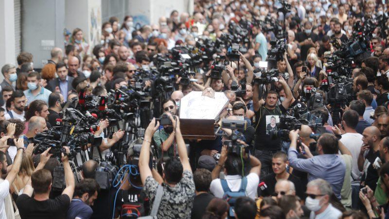 People take part in a funeral ceremony of the Georgian cameraman Lekso Lashkarava in Tbilisi, Georgia, 13 July 2021. Georgia's TV channel TV Pirveli's cameraman Lekso Lashkarava, who was beaten by far-right activists during the anti-Pride rally on 5 July, died on 11 July. - Avaz