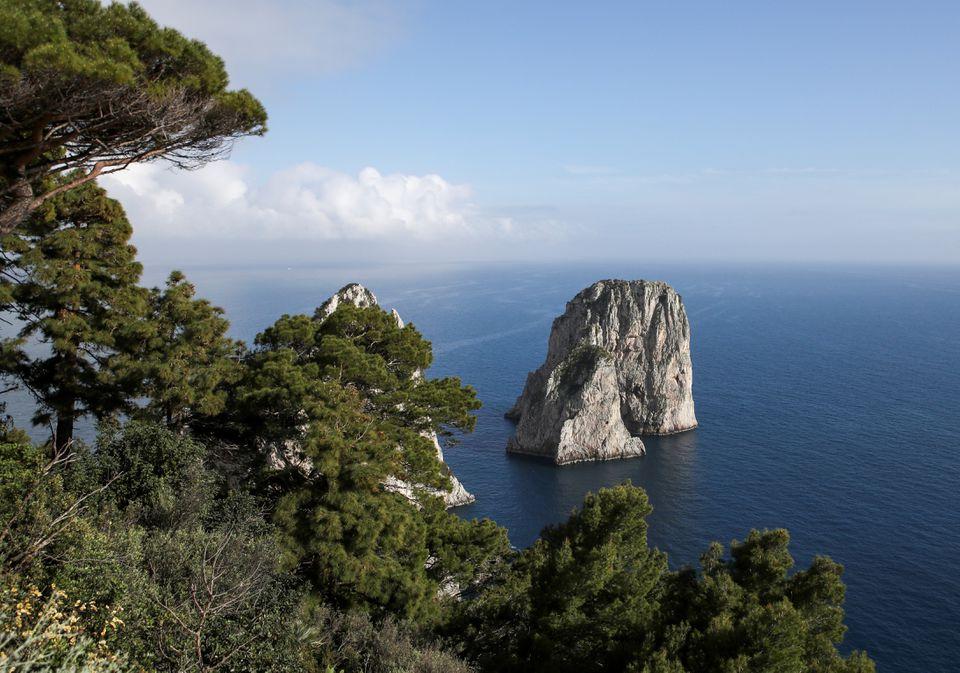 A view of the Faraglioni giant rocks off the coast of Capri, where the surrounding seabed has been devastated by illegal fishing of valuable shellfish known as date mussels, in Capri, Italy, April 28, 2021. - Avaz