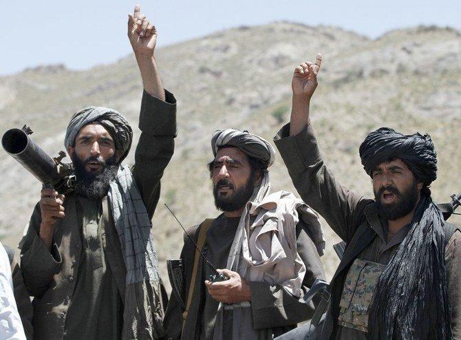 In this May 27, 2016 file photo, Taliban fighters react to a speech by their senior leader in the Shindand district of Herat province, Afghanistan - Avaz