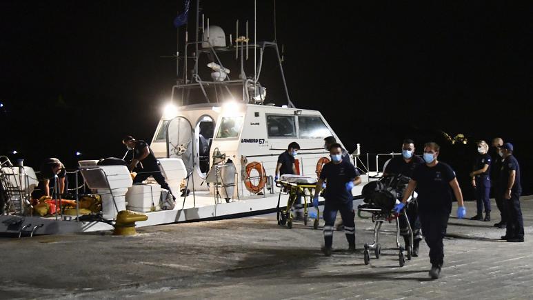 A coast guard vessel arrives with two bodies at Pythagorio port, on the eastern Aegean island of Samos - Avaz