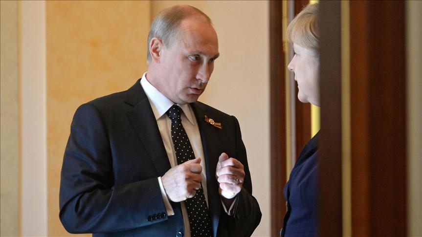 Putin and Merkel - Avaz