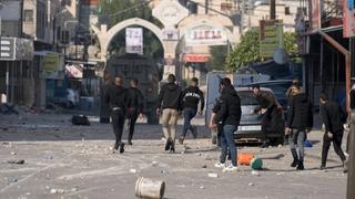 Palestinians say Israeli troops kill 9 in West Bank raid