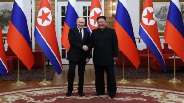 Vladimir Putin i Kim Džong un - Avaz