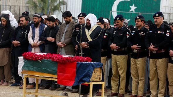 Police officials and others attend the funeral prayer of a police officer, a victim of Monday's suicide bombing, in Peshawar, Pakistan - Avaz