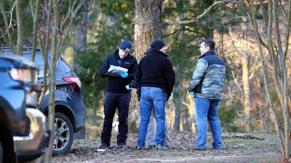 Law enforcement personnel investigate the scene of multiple shootings on Arkabutla Dam Road in Arkabutla, Miss on Friday - Avaz